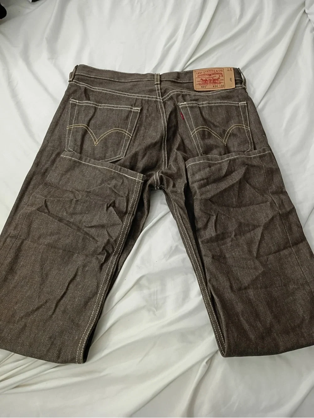 Levi's brown straight-leg jeans with contrast stitching
